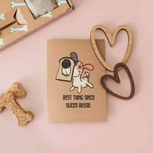 Greeting card with the phrase ‘Best Thing Since Sliced Bread’ and a dog illustration.